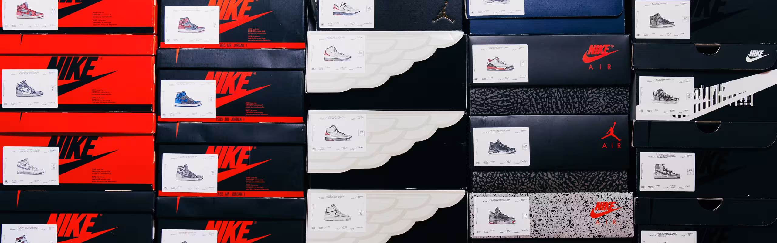Stack of sneaker boxes with labels generated with STACKBASE™
